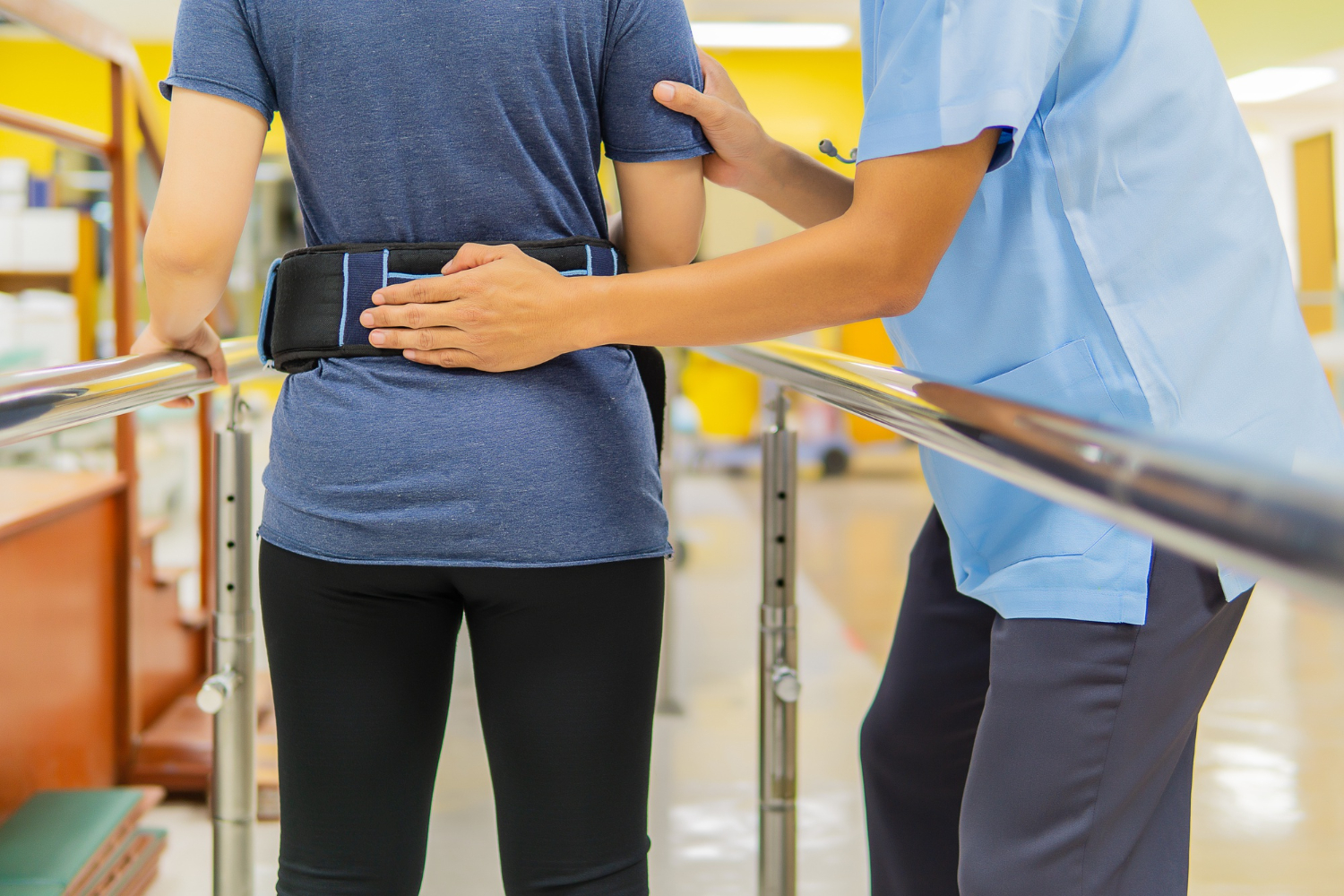 Patient receiving back rehabilitation support